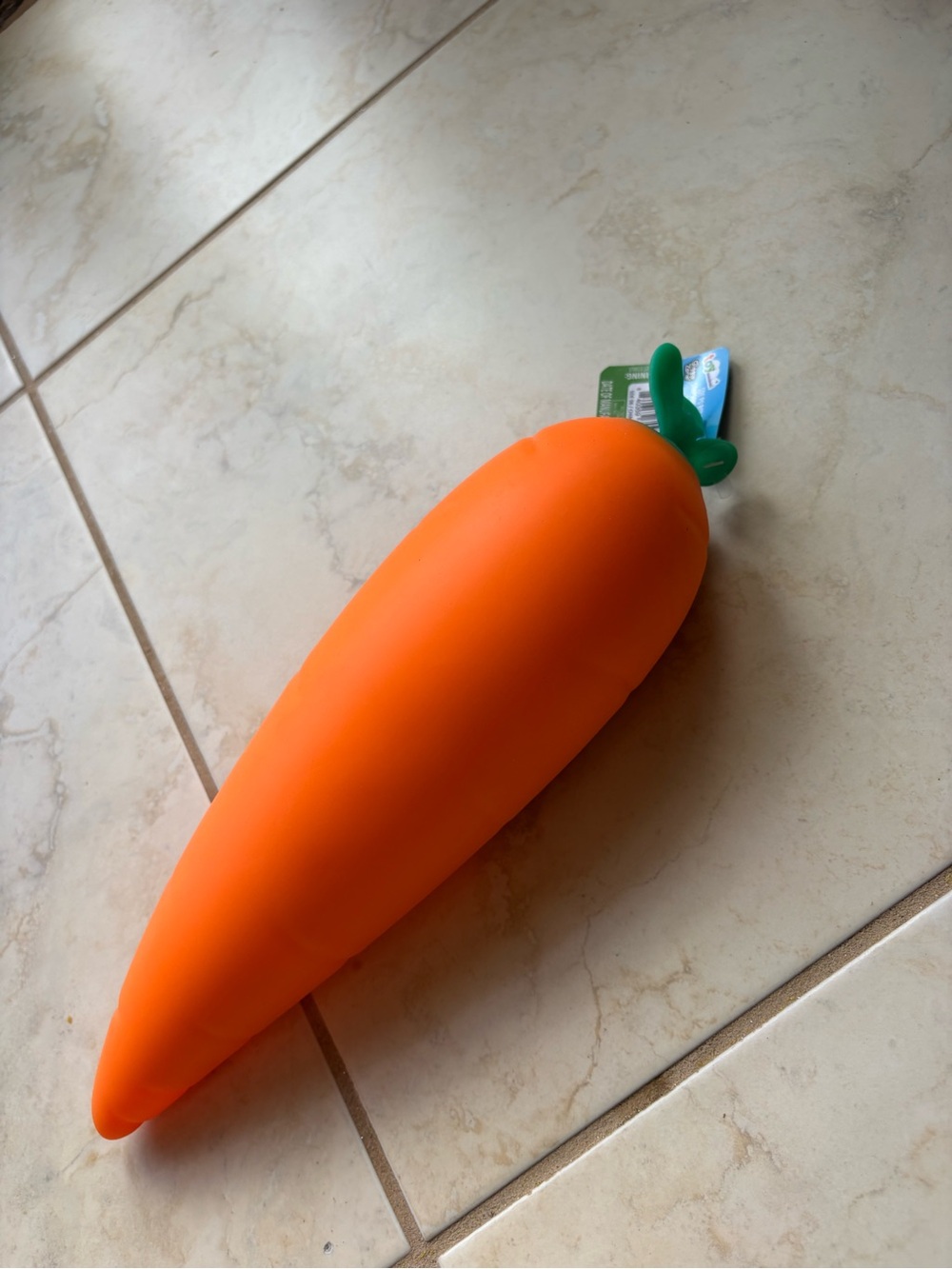 Carrot-Shaped Squeezy Squishy Toy in Bright Orange with Green Top